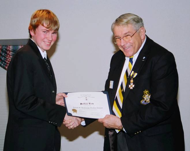 Runner up Nathan Cvrk recieves his certificate from Second Vice President John �Jack� Sweeney.