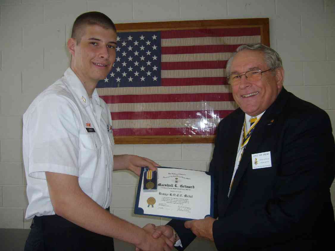 Fairfax Resolves President Jack Sweeney presents the SAR Bronze JROTC Medal to Cadet Marshall L. Grimard