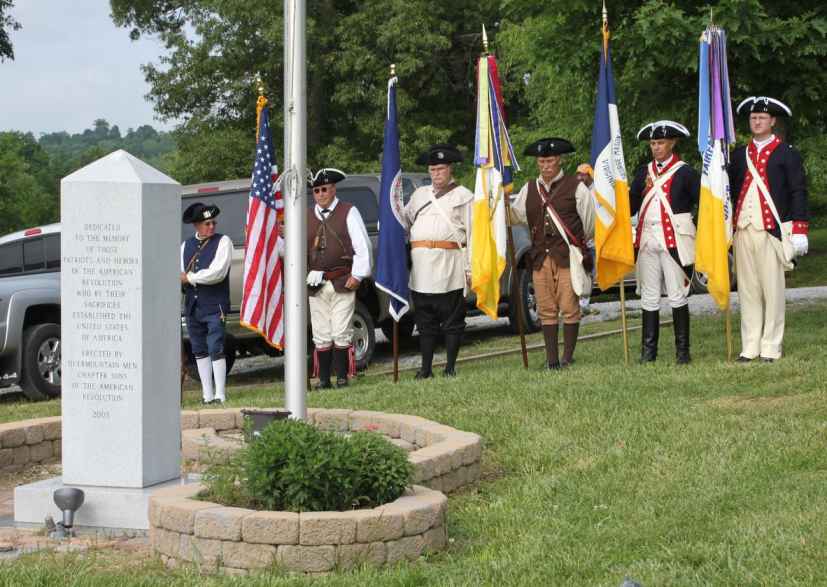 Chapter President Darrin Schmidt and Peter Davenport (President of the George Mason Chapter) carry their Chapter flags as part of the Color Guard.